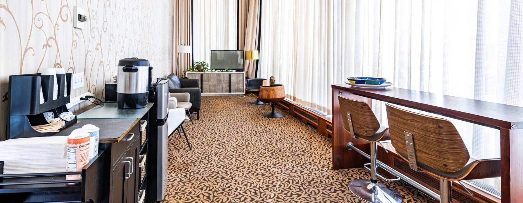 a room with a table and chairs